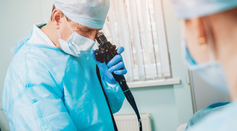 Endoscopy at the hospital. Doctor holding endoscope before gastroscopy. Medical examination